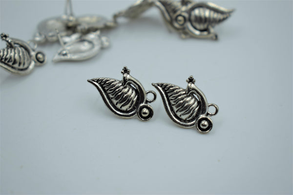 Studs for earrings in alloy 100 gram