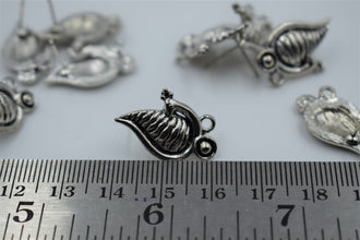 Studs for earrings in alloy 100 gram