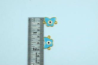 Butterfly Shape Sky Blue Color Evil Eye Rakhi pendant